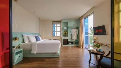 Deluxe Double Room with Balcony — M Village Hotel Tao Đàn Park, a brand of Modern Village Lifestyle
